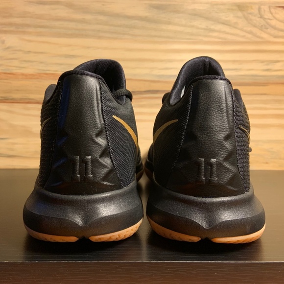 kyrie black and gold basketball shoes